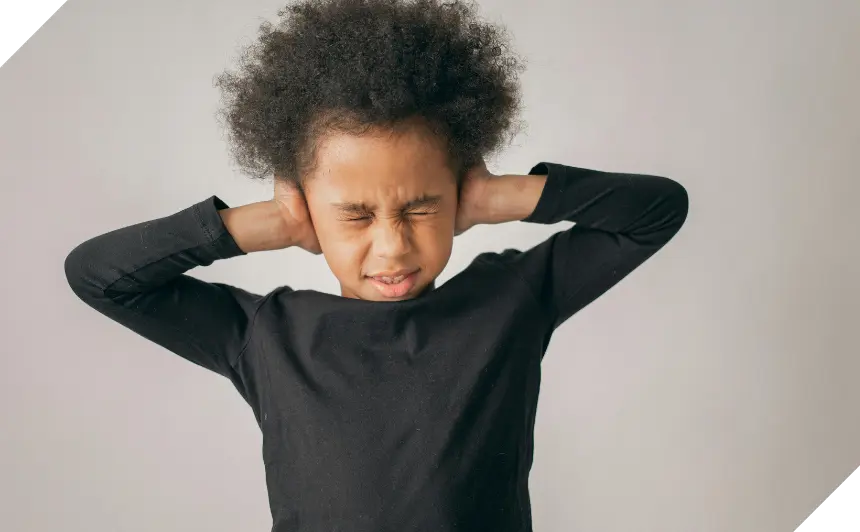 ASB Child With Hands Over Ears